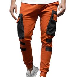 Men's Pants Winter cargo pants mens large side pockets fine texture contrasting color patchwork sports pants tight fitting mens work pants J240429