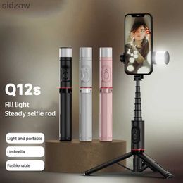 Selfie Monopods Portable wireless Bluetooth selfie stick with foldable tripod equipped with fill light shutter remote control suitablees WX