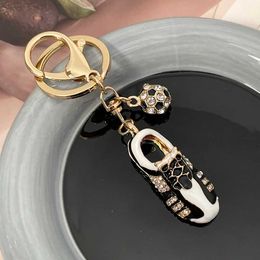 Keychains Lanyards Creative Rhinestone Football Shoes Keychain Mens Keychain Car Keyring Accessories Womens Bag Charm Pendant Mens Keyring Q240429