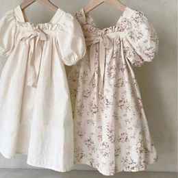Dresses Korean version of summer dress girls baby bow bubble sleeve sweet floral square neck 240428