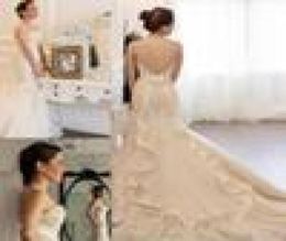 2021 Uniques Designers Mermaid Wedding Dresses With Ruffles Train Sweetheart Sexy Lace Backless Vintage Plus Size Bridal Gowns4130813