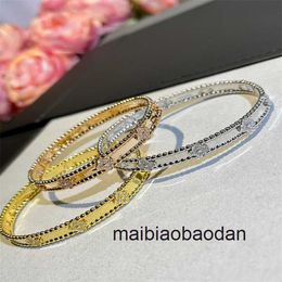 Designer Original 1to1 vancllf Luxury Jewellery S925 sterling silver gold-plated kaleidoscope narrow edition small flower bracelet fashionable four leaf oval bead