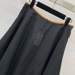 Skirts Designer 24 New waist contrasting leather edging triangle decoration with side pockets zippered high waisted mid length skirt
