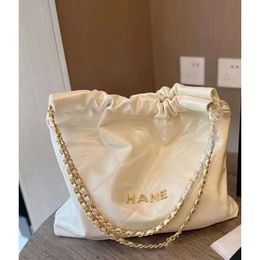 tote handbag wind bright oil wax face chain bucket bag chenel letter gold coin Tote Bag Single Shoulder Messenger Bag female garbage bag