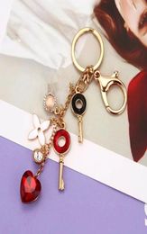 Keychains Classic Fashion Crystal Clover Keychain Charm Jewellery Rhinestone Car Key Ring Female Bag Pendant Accessories4723174