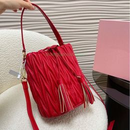 denim designer bag miuimiui Instagram trendy crossbody bag Western pleated soft underarm bag water bucket bag tassel shoulder crossbody bag for women