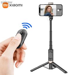 Selfie Monopods Mobile tripod extension Bluetooth wireless selfie stick holder Foldable tripod with fill light suitable for smartphones WX