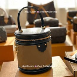 Luxury CANNES designer bag women handle shoulder handbag Makeup bags vanity pochette petite cross body adjusted strap Drum Cylinder Mini Bag M43986