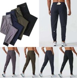 LU Womens LL Mens Jogger Long Pants Sport Yoga Outfit Quick Dry Drawstring Gym Pockets Sweatpants Trousers Casual Elastic Waist Fitness Designer Pants999