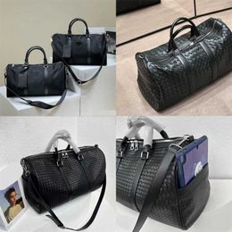 Sell Large Capacity Travel Bag Designer Duffle Bags Large Capacity Sports Fitness Bag Black Woven Shoulder Bags Leisure Portable Luggage Pouch 230915