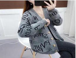 Vneck contrast cardigan sweater new women039s autumn Korean version versatile loose short outer wearing knitted top4914160