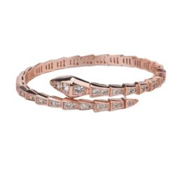 Bulgarilies Bracciale Designer Lusso Moda Donna Qualità originale Osso di serpente Pieno di diamanti Primavera spessa placcato oro Moda Edizione stretta a forma aperta