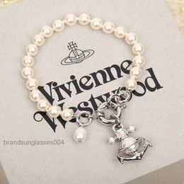 Designer Luxury Jewellery VivienenWestwoods Satellite Viviane Westwood High Version Empress Dowager Dowagers Anchor Saturn Pearl Bracelet Female Niche Design Lig