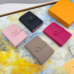 fashion high-quality men Womens designer Vertical Wallets luxurys purse classic flower letter short card holder Taurillon Leather Letter sliding buckle 9517