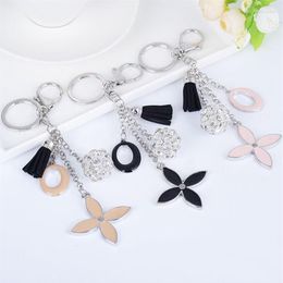 Keychains Creative Simple Four-leaf Clover Keychain Flowers Key Chain Car Ring Female Bag Charm Pendant Fashion Tassels KeyringsKe213I