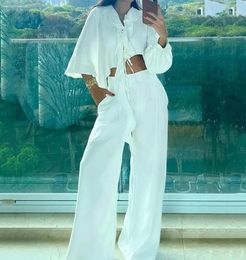 Women's Two Piece Pants Fashion 2024 Summer Casual Solid Color Design With Irregular Ruffle Collar And Ribbon Top Wide Leg Set