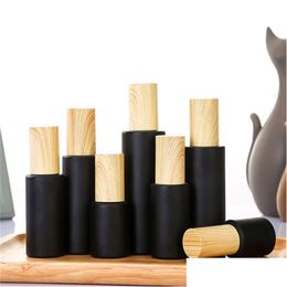 Packing Bottles Wholesale Black Frosted Glass Cosmetic Bottle Empty Cream Jars Spray Lotion Pump Refillable Container With Wood Grai Otze9