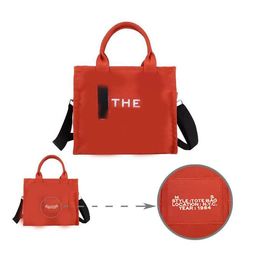 2023 The tote Bag Famous Designer bag Cool Practical Large Capacity Shoulder Handbag Women Coin Purse Crossbody Casual Square Canvas