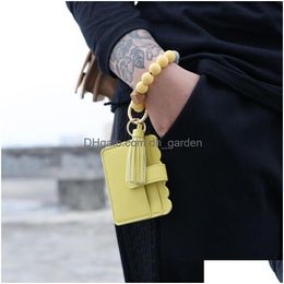 Charm Bracelets Leather Card Bag Tassel Sile Bead Wristband Cuff Wallet Keychain For Women Fashion Drop Delivery Jewelry Dhhf4