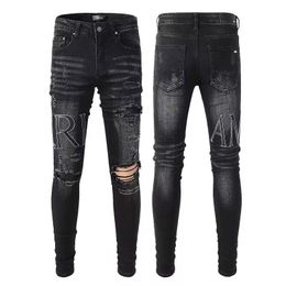 Jeans da uomo firmati High Street fiore Denim Wreath nero Jeans dritti lavati Pantaloni larghi impilati jeansbiker camionista giacca viola Moda vintage Patc in pelle