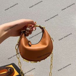 Women's luxury crossbody handbag New Mini Wrist Bag wallet Top leather Fashion brand Mid ancient crescent armpit bag Black one shoulder letter handbags