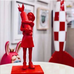 Hugging Bomb Girl Statue Resin Hugger Peace Sculpture Modern Street Art Home Decor Desk Decoration 240129