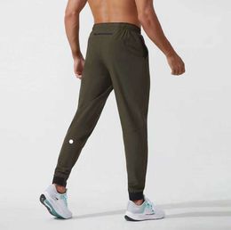 Lululemen uomo Lulu pantaloni corti Yoga Outfit Jogger Sport Quick Dry Coulisse Palestra Tasche Pantaloni sportivi Pantaloni Uomo Casual Elastico in vita Fitness ventilato