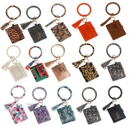 Kimter PU Purse Key Chain Bracelets Car Bag Tassel Leopard Printed Bangle Wristlet Card Wallet Keychains Bracelet Keyring DHL5554373