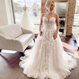 2024 Arabic Sexy Vintage A Line Wedding Dresses Sweetheart Sleeveless Tulle Lace Appliques Button Back Plus Size Bridal Gowns