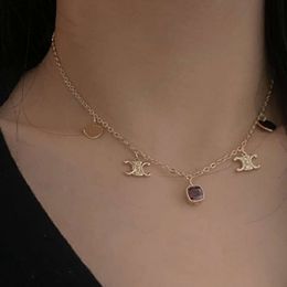 Light luxury style letter sequin tassel necklace with a high-end sense temperament collarbone fashion trend neck chain niche women