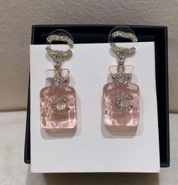 2024 Luxury quality charm drop earring with diamond in silver plated pink and blue Colour bottle design have stamp box PS3933A