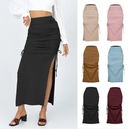 Skirts 2024 European And American Split Knitted Slim Skirt Fashion Pleated Lace Up Women's Sexy Hip Long Girl Black