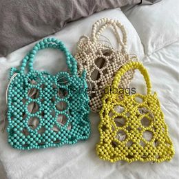 Totes Fashion Wooden Beading Women Handbags Designer Hollow Small Tote Luxury Lady Summer Beach Bag Bali Shopper Purses 2022H24217