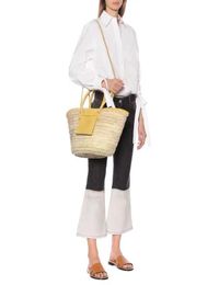 2021 latest style niche vegetable basket fashion handbag woven vacation beach straw Female bag3225418