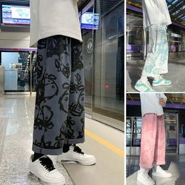 Pantaloni a gamba larga Streetwear Vita media Vita elastica Tasche con coulisse Pantaloni da uomo Stampa cartoon Dritto 240122