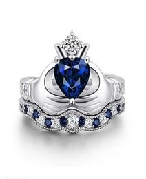 OMHXZJ Whole Solitaire Rings European Fashion Woman Man Party Wedding Gift Crown White Blue Zircon 18KT White Gold Ring RR6017298254