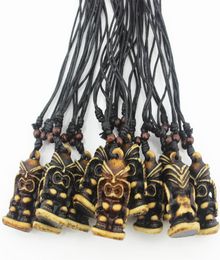 Fashion Jewelry Whole lot 12pcs COOL 3D Tiki Necklace Totem Simulation Bone Carved Hawaiian Brown Totem Tiki Men Pendant Neckl9801381