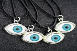 Whole 50pcsLot Fashion Evil Eye Pendants Turkish Luck Charms Necklaces Alloy Jewellery HJ2014274290