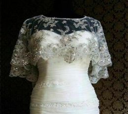 Real Image Sparkling Wedding Cloak Jacket New Ivory White Sleeveless Bridal Lace Applique Sequins Cape Wraps Custom Jackets8150951