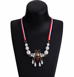 Whole Bohemian Fashion Crystal Pearl Bee Pendant Necklace Striped Ribbon Sweater Chain Women Charm Jewellery Accessories1449940