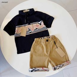 Luxury kids Tracksuits Baby lapel Short sleeved suit Size 100-140 summer Splicing design POLO shirt and khaki shorts Jan20