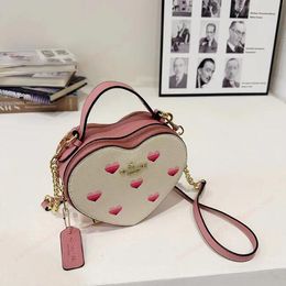 Classic Logo Women's Bag Cute Heart-Moving Striped Messenger Bags New Presbyopic Love Box Women's Bag wangwang898