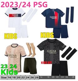 Paris Maillots de football 23 24 KIDS Paris maglia da calcio 2023 2024 Lee Kang In M.ASENSIO O.DEMBELE MBAPPE camicia da ragazzo set calzini uniformi maglia piede