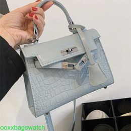 Ky Leather Handbag Trusted Luxury Womens Bags Small Bag Womens Light Luxury Ins Tide 2024 New Popular Crossbody Bag Design High Sense Small Handheld Ky B with LOGO HBK1