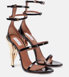 Famous Brand Black Patent Calfskin Cabaret Sandals with 100mm Electroplated Heel and Ankle Buckle for Evening Parties