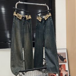 Kvinnors designer jeans höga midja med mager jeans med lapel bokstav design retro nödställda djupa blå jeans för män kvinnor