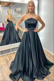 Simple Black A Line Long Prom Dress Strapless Neckline Formal Evening Gown Backless Open Back Party Gown Sweep Train