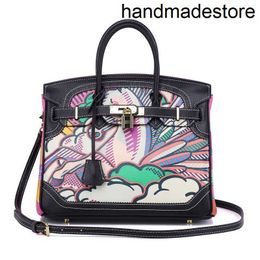 2024 Designer Bag Colored Double Sided Pattern Printed Fashion Women's Topcoat Cowhide Handheld Straddle