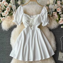 Basic Casual Dresses Square neckline shoulder gentle womens dress summer puff sleeves solid bow tie hollow vest high waist ultra-thin white dress J240222