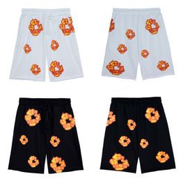 Women's shorts, spring and summer new men's casual pants, versatile flame flower print